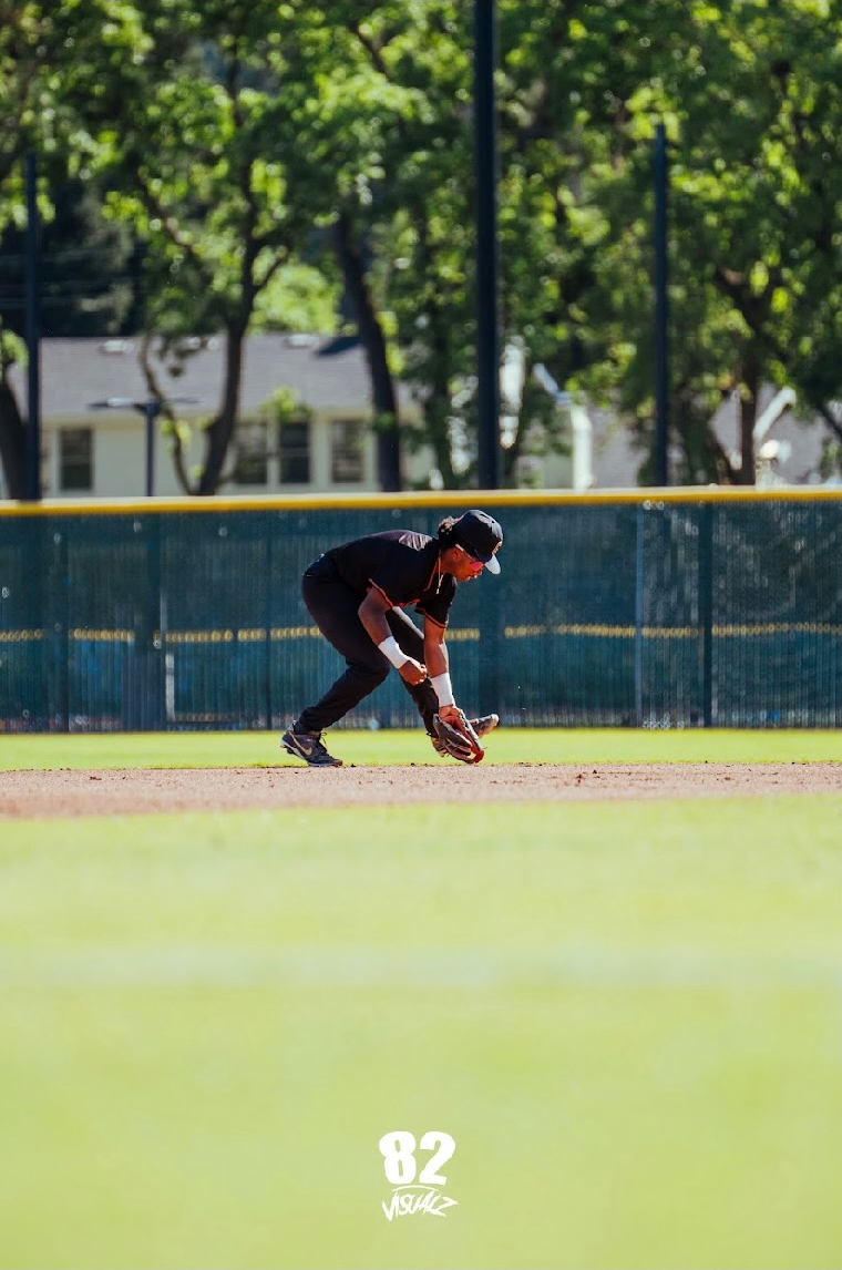 Kai Watts fielding a ground ball